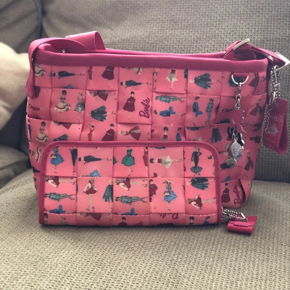 Harveys Seatbelt crossbody with matching wallet.